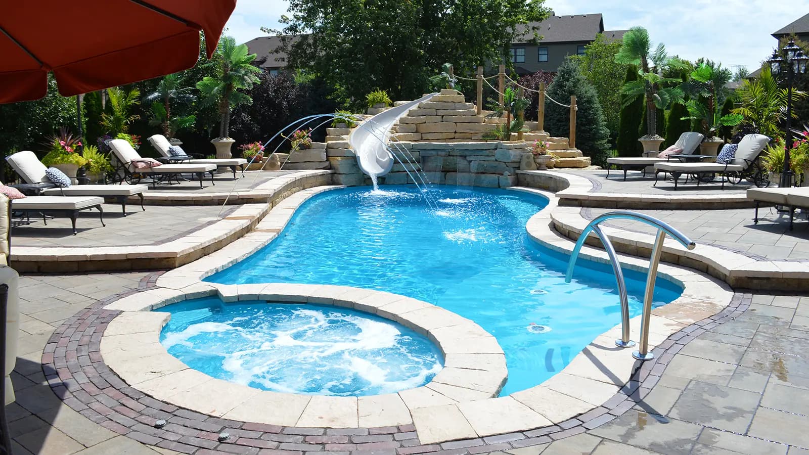 Outdoor swimming pool with lounge chairs